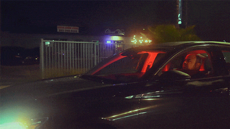 A GIF of Khalil driving his car through his West Coast hometown.