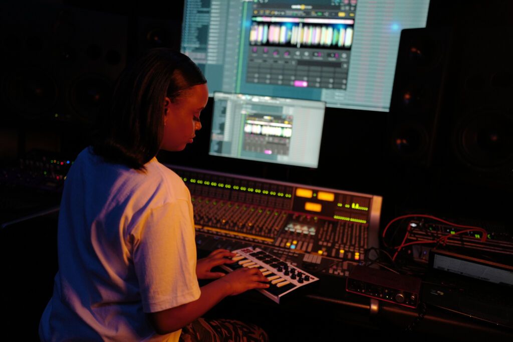 Dana Lu, producing in a recording studio